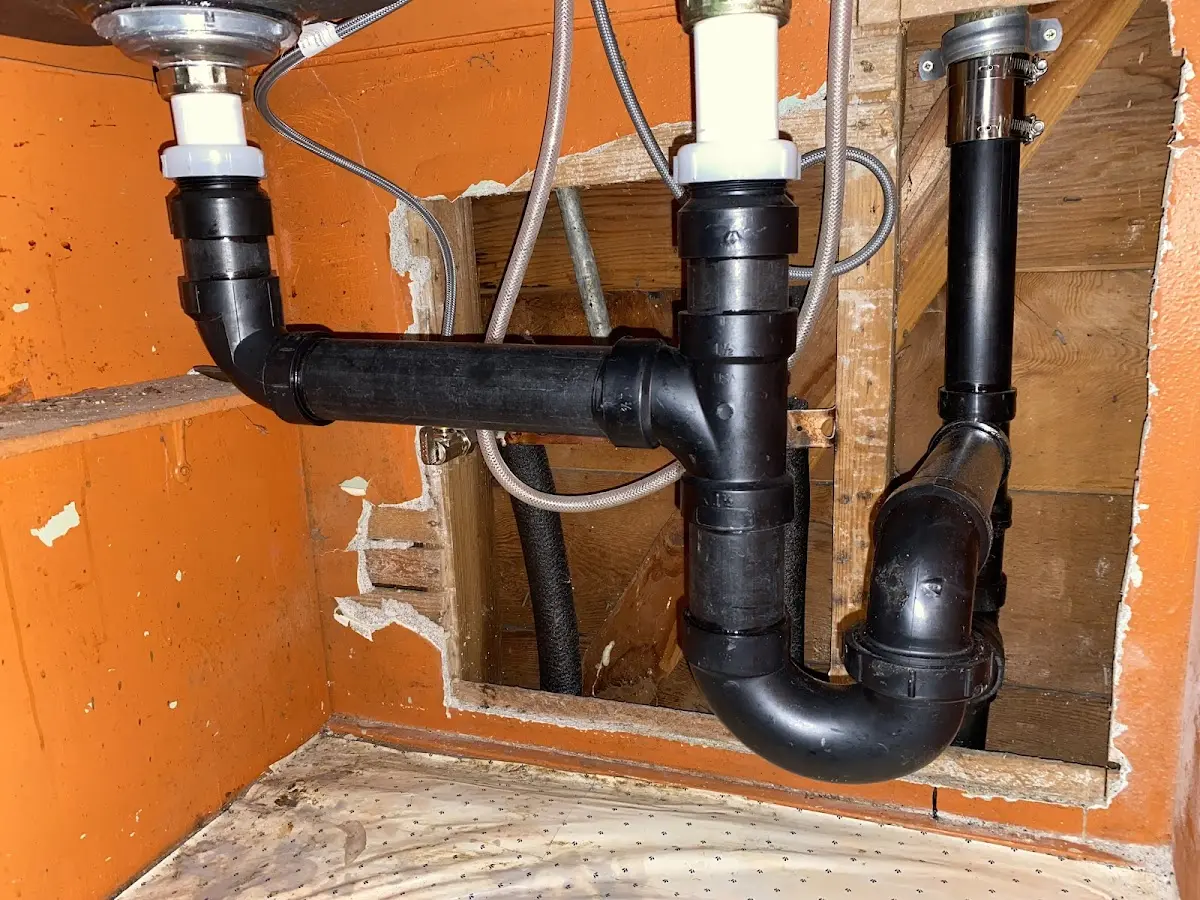 Professional Garbage Disposal Repair equipment and tools on the job in Fairfield